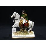 A Continental Porcelain Military Equestrian Figure Of Napoleon