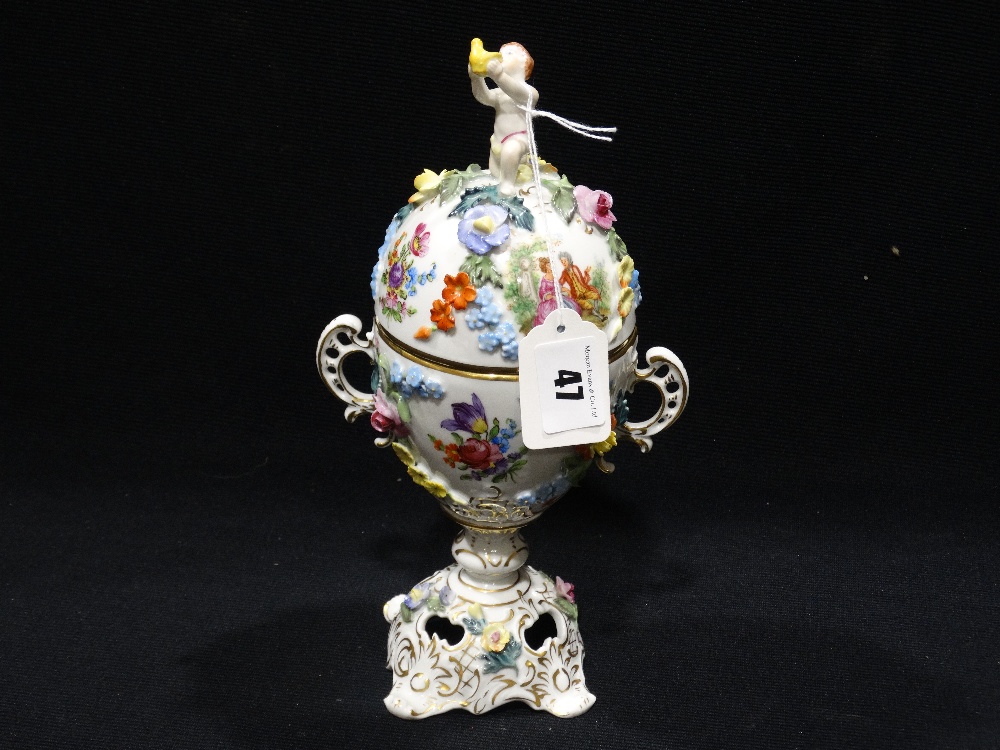 A Dresden China Two Handled Pot & Cover With Cherub Knop & Floral Bocage, 10" High