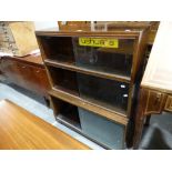 A Pair Of Mid Century Mahogany Finish Three Section Stacking Bookcases