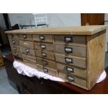 A Stripped Pine Apothcary Style Multi Drawer Cabinet