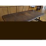 A Dark Oak Finish Ercol Coffee Table With Magazine Rack