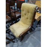 A Victorian Walnut Framed Nursing Chair