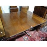 A 19th Century Mahogany Pedestal Dining Table On A Quatrefoil Base