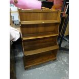 A 20th Century Polished Oak Waterfall Open Bookcase