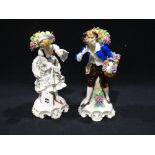 A Pair Of 20th Century Continental Porcelain Fruit Seller Figures In The Meissen Style