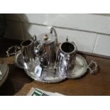 A Three Piece Plated Tea Service, Together With A Two Handled Plated Serving Tray