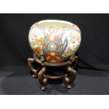 A 20th Century Chinese Circular Pottery Fish Bowl, The Exterior Decorated With Figural Panels, On