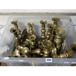 A Quantity Of Antique Brass Candle Holders