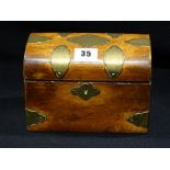 A Georgian Oak Dome Topped Tea Caddy With Brass Mounts