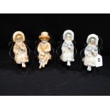 Four Edwardian Bisque China Figures In Bentwood Chairs