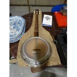 A Six String Guitar Banjo & Case