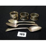 Three Silver Serviette Rings, Together With Three Silver Spoons