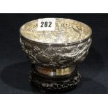 A Circular Chinese Export Silver Bowl, The Body Decorated With Entwined Chinese Dragons, Marks For