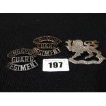 A Singapore Guard Regiment Silver Cap Badge & Bronzed Colour Dogs