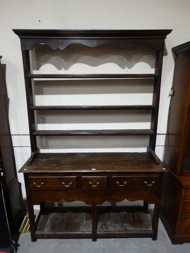 An Antique Oak Dresser, The Base Having Three Drawers With Open Pot Board Shelf, The Associated Top