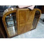 An Art Deco Period Walnut Veneered Three Door China Cabinet With Curved Top, 60" Wide