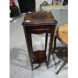 An Edwardian Mahogany Two Tier Jardiniere Stand