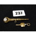 A Gold Swivel Top Watch Key & Another