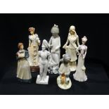 A Group Of Seven Various Ceramic Figures, Including Nao