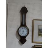 An Edwardian Oak Encased Aneroid Wall Barometer