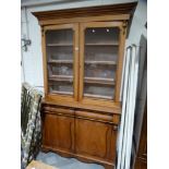 A Victorian Mahogany Two Door Bookcase Cupboard With Shield Panels