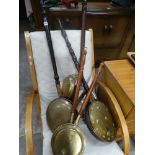 A Quantity Of Copper & Brass Warming Pans