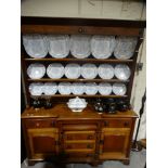 A Late 19th Century Oak & Mahogany Anglesey Break Front Dresser, Three Shelf Rack With A Base Of