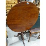 A 19th Century Mahogany Circular Topped Tilt Tripod Table