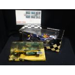 Two Boxed Collectors Formula 1 Cars