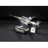 A Chrome Finish Table Lighter In The Form Of A Jet Plane