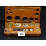 A Mahogany Cased Apothecary Scale Weight Set