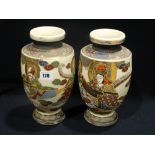 A Pair Of Early 20th Century Oriental Pottery Circular Based Vases