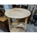 An Antique Pine Cricket Table With Base Shelf