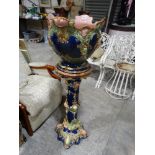 A Staffordshire Pottery Majolica Glazed Jardiniere & Pedestal (Jardiniere Af) Pedestal Height 34"