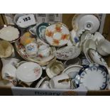 A Collection Of Mixed Miniature Ceramic Cups & Saucers