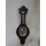 An Edwardian Oak Encased Aneroid Wall Barometer