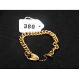 A 9ct Gold Link Bracelet With Heart Shaped Padlock