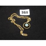 A 9ct Gold Flat Link Chain With Blue Stone Pendant