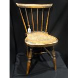 An Antique Spindle Backed Childs Chair