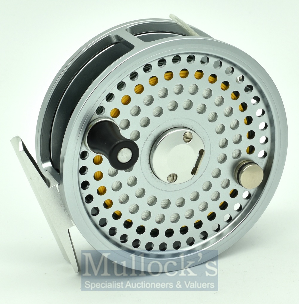 J W Young Jubilee 4” high tech alloy salmon fly reel in silver finish, black counter balanced
