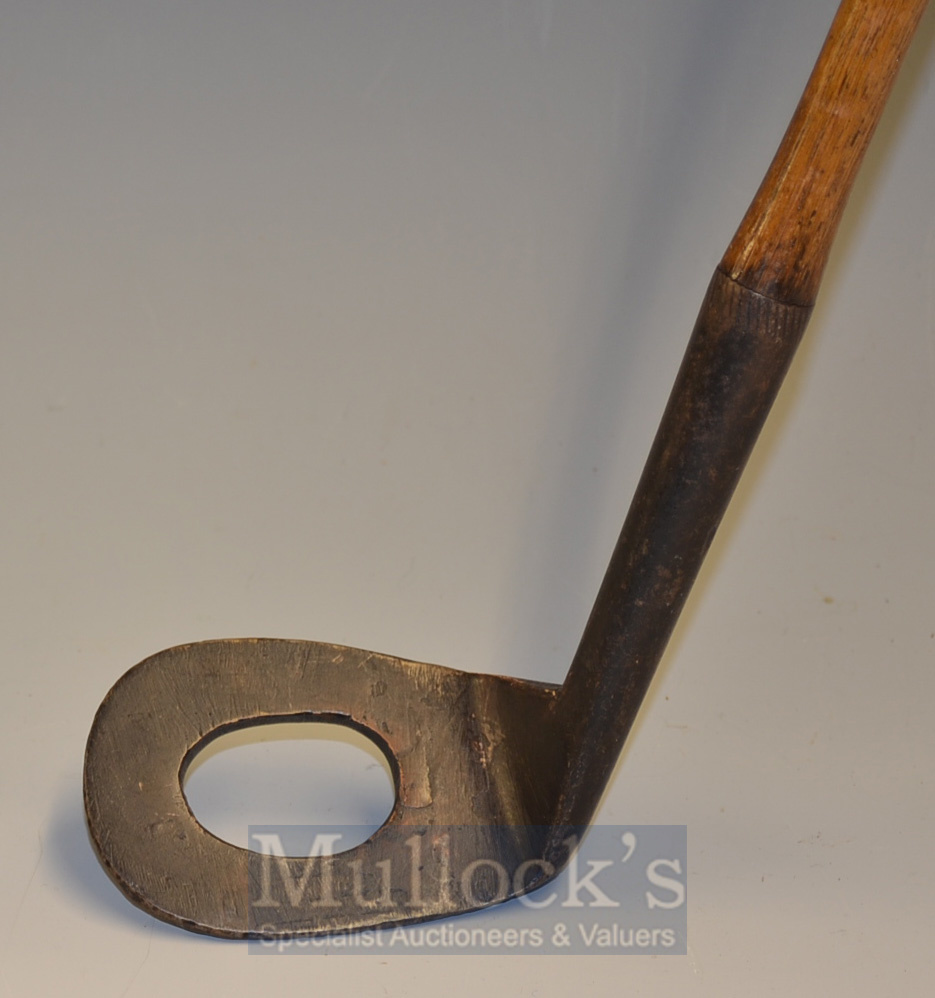Water Iron Niblick with oval hole to the centre of the face