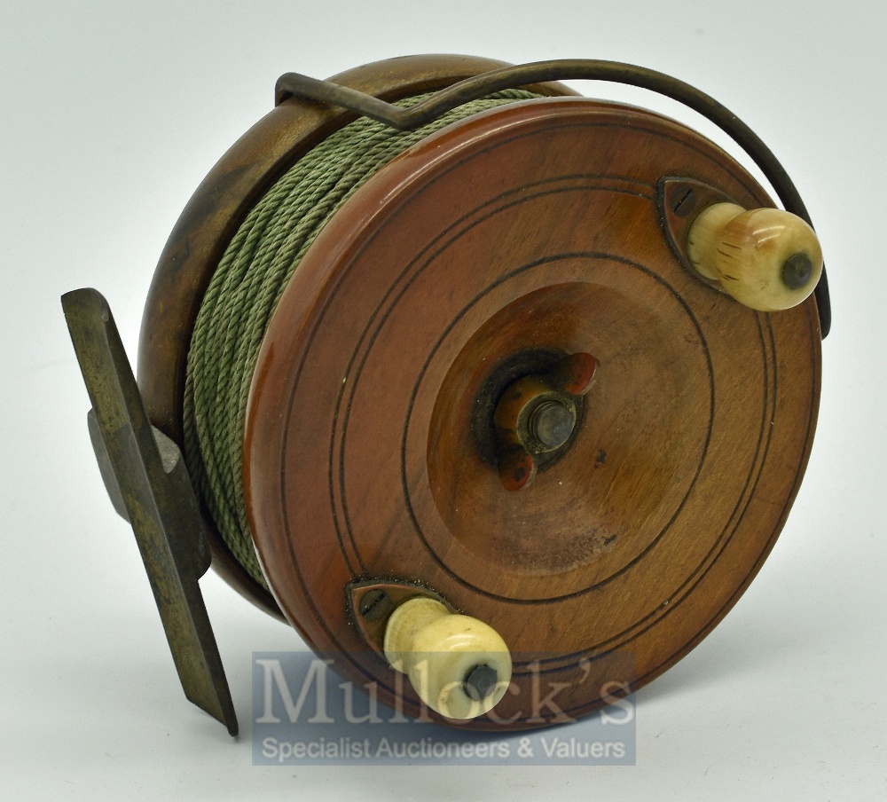 Nottingham 4” wooden and brass star back centre pin reel c. 1920 - Twin handled, centre butterfly - Image 2 of 2