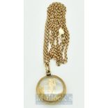 9ct gold Golf Pendant and yellow metal chain – glass and 9ct gold pendant featuring a golfer stamped