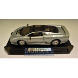 Maisto Jaguar XJ220 Diecast Model Toy: 1:12 Scale 1992 Silver on black plastic base in original box