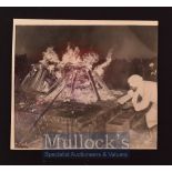 Gandhi Press Photograph ‘A souvenir hunter scoops ashes from the burning funeral pyre’, notes and