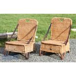 Pair of early 20th Century Rattan Cane Folding Fishing Seats – With leather supporting straps,