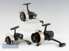 3x various Abu spinning reels – early 444 black body and grey spool used (tiny chip to foot);