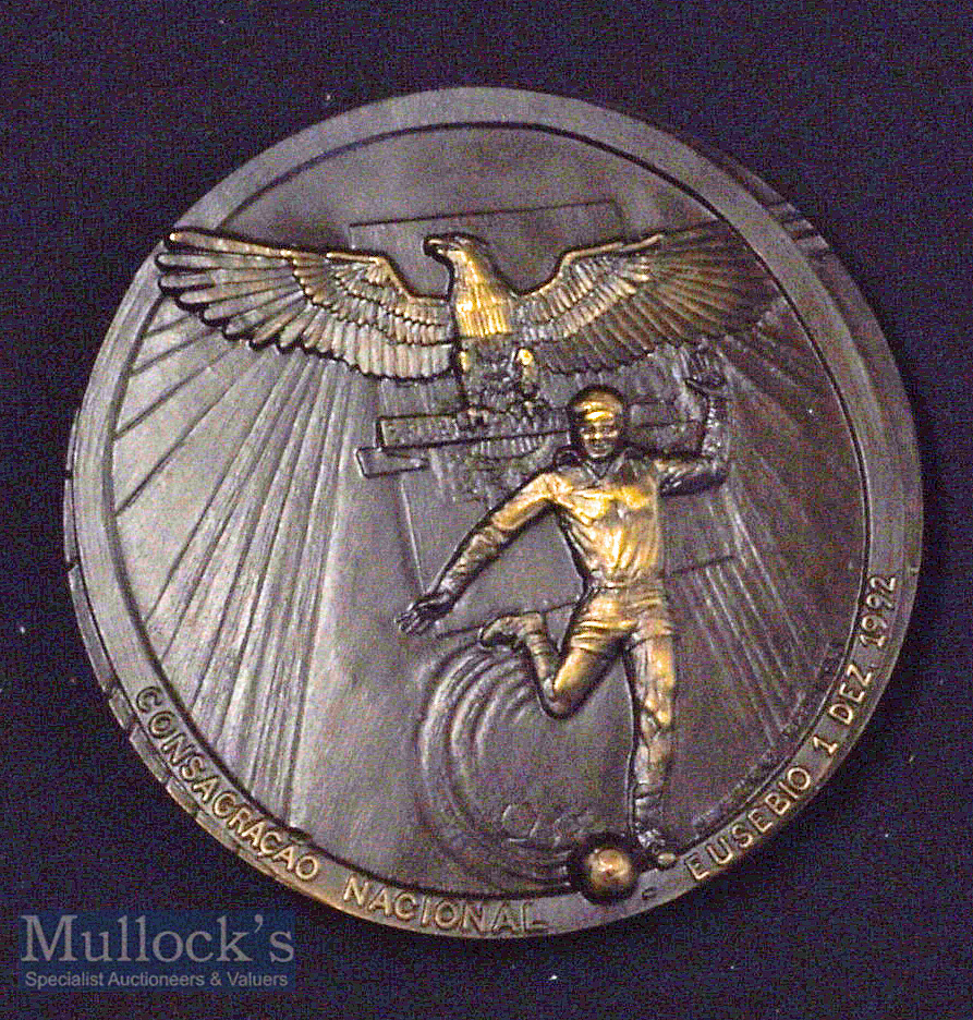 Bronze coloured Portuguese medallion^ weight 220 grams approx.^ in celebration of Eusebio covering