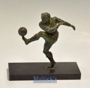 20thc spelter figure of a footballer punting the ball – mounted on a rectangular base – overall 8”