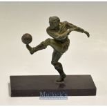 20thc spelter figure of a footballer punting the ball – mounted on a rectangular base – overall 8”